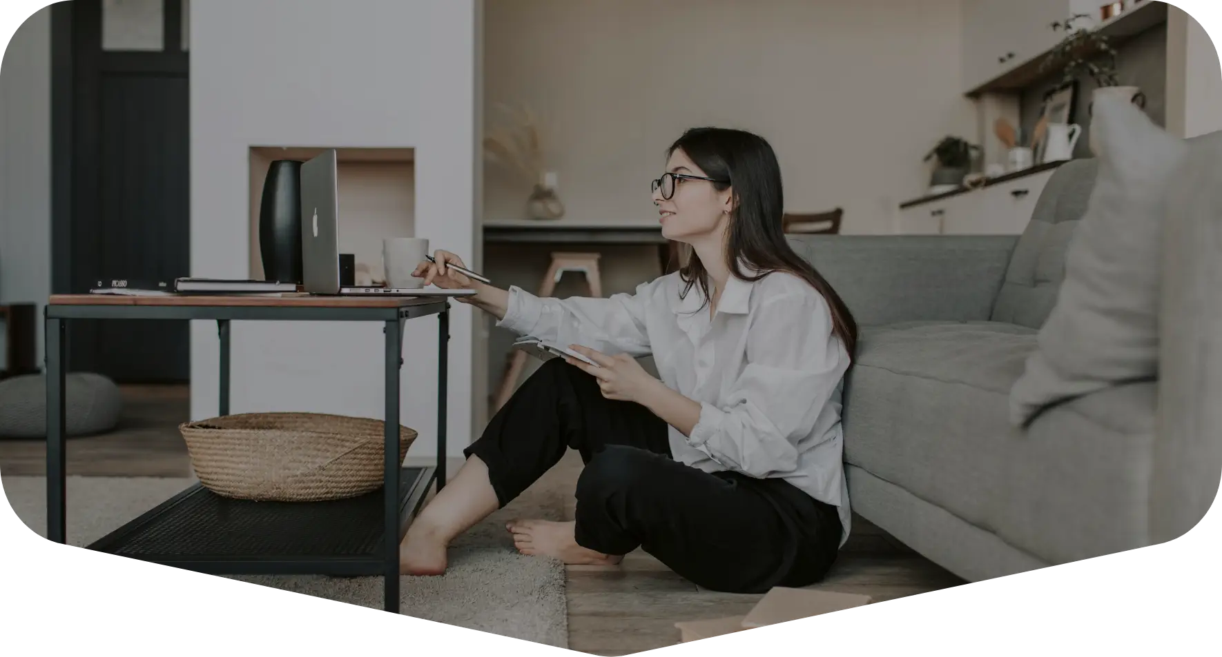 Student reading blog on laptop at The U apartments in Davis CA